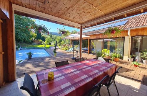 Anould Bed & Breakfast | Chambres de charme avec jacuzzi, hammam et piscine, au cœur de la nature près de Gérardmer - FR-1-589-489