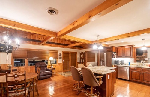 White Cabin | Champion Charmer - Spacious Backyard w/ Grill