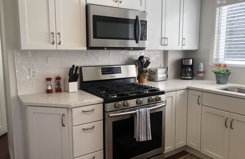 North Muskegon Cottage | CHANNELSIDE COTTAGE! Amazing views of Muskegon Lake & 10 mts from Lake Michigan!