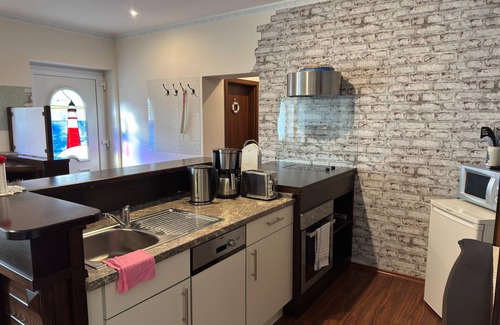 Wiek Apartment | Charmante Ferienwohnung mit Garten in Wiek