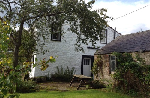 Penrith Cottage | Charming, 18th Century Oak-Beamed Cottage with Large Gardens By A Small River