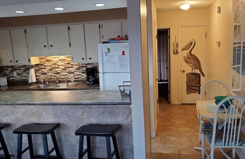 Holiday Beach Condo | Charming 1Br Condo on the beach with pool outside back door and beach access.