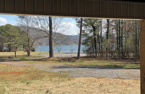 Guntersville Cabin | Charming 2-bed 2-bath cabin with views of Lake Guntersville from every room.