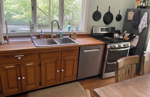 Reliance Cottage | Charming 2-bedroom cottage right on a 30’ wide whitewater creek in Reliance, TN