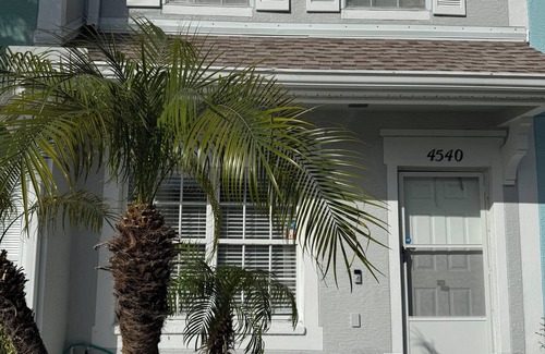 Peridia Country Club House | Charming 2-bedroom Key West style townhome with pool! Lakefront Serenity