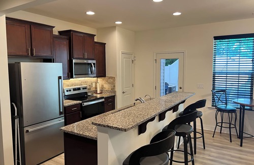 Southeast Raleigh House | Charming 2-bedroom townhome that's fenced with private backyard.