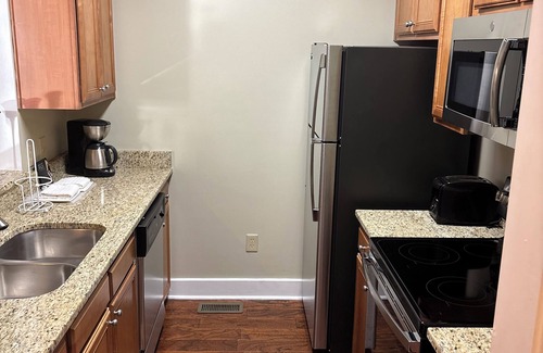 Lackey Condo | Charming 2-bedroom condo in marvelous Williamsburg with WiFi, fitness room