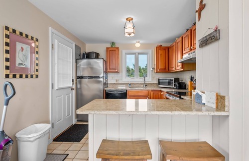 East Sandwich Cottage | Charming 2 story cottage is located in exclusive Cape Shore Village overlooking Scorton Creek