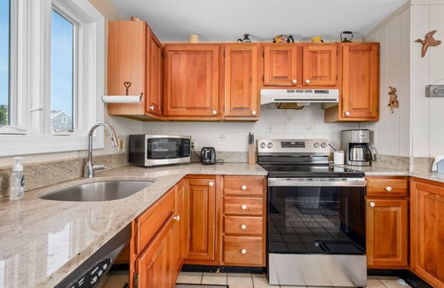 East Sandwich Cottage | Charming 2 story cottage is located in exclusive Cape Shore Village overlooking Scorton Creek