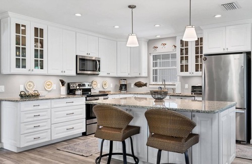 Boca Grande House | Charming 2BR home with pool view in Boca Grande's North End, perfect for relaxation.