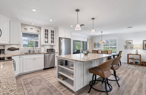 Boca Grande House | Charming 2BR home with pool view in Boca Grande's North End, perfect for relaxation.