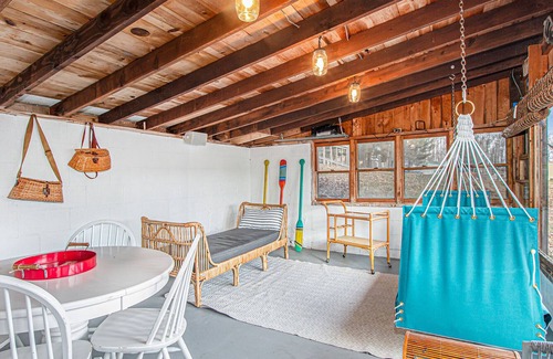 Newaygo Cottage | Charming 2BR Lakefront Cottage Retreat with Private Dock & Beach