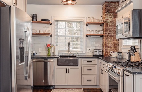 Sans Souci House | Charming 2BR with Fireplace, Pets, Close to Furman
