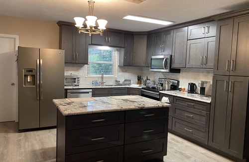 Edgewater House | Charming 3 bedroom 2 bath home w/wraparound veranda on one acre of land.