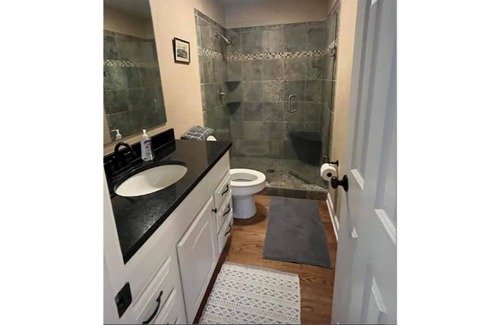 Lynn House | Charming 3 bedroom home with patio and fireplace