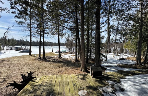 Fife Lake Cabin | Charming 3 bedroom log cabin on Pickerel Lake in Fife Lake, MI + a guest house