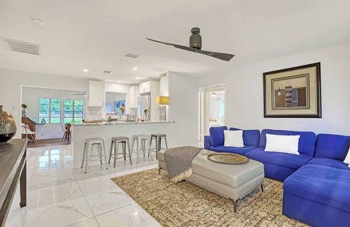 Florida North Atlantic Coast House | Charming 3BR Canal Home w/patio dining, Fire Pit & Workspace