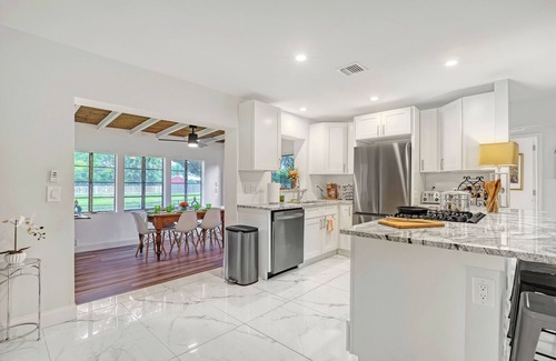 Florida North Atlantic Coast House | Charming 3BR Canal Home w/patio dining, Fire Pit & Workspace
