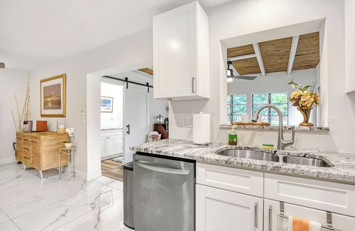 Florida North Atlantic Coast House | Charming 3BR Canal Home w/patio dining, Fire Pit & Workspace