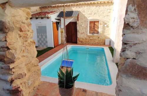 El Colmenar Cottage | Charming 4-Bedroom House with Shared Pool in Benarrabá, Spain