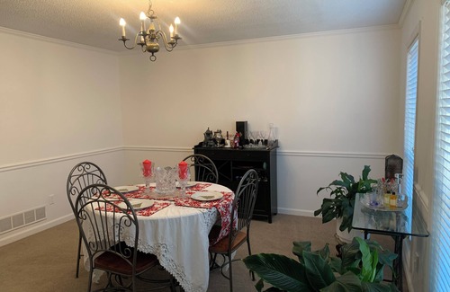 Marietta House | Charming 4-bedroom house with fireplace, sunroom, & massive back yard.