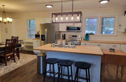 Chester House | Charming brick home set in the woods on 45 acres with pond and trails.