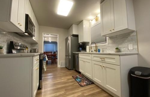 Logan House | Charming Brick Home with bonus space & foosball
