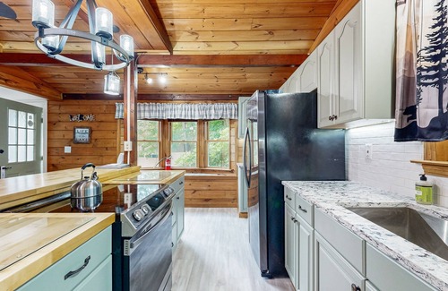Alton Bay House | Charming centrally located cottage, screened in porch and walk to lake