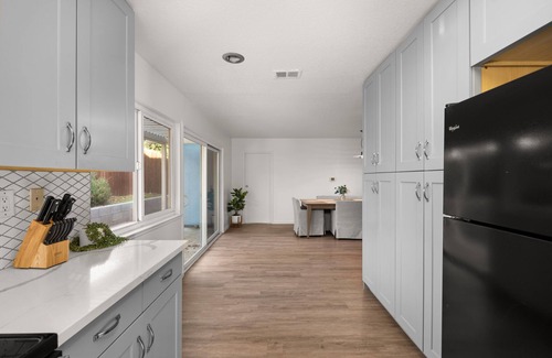 Claremont House | Charming Claremont home near parks and shopping, with open layout and large lot.
