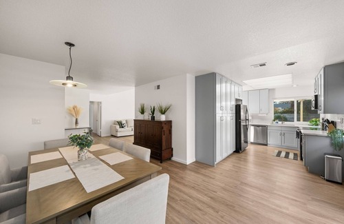Claremont House | Charming Claremont home near parks and shopping, with open layout and large lot.
