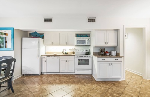 West Beach Village Condo | Charming condo with private beach access, on-site golf, high-speed WiFi & AC