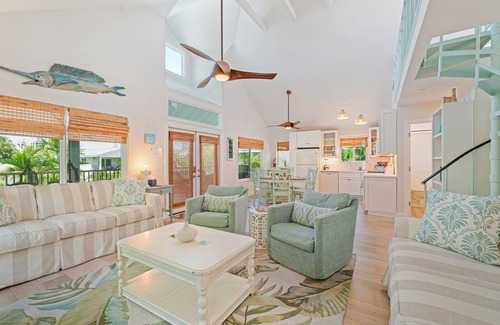 Anna Maria House | Charming cottage with heated pool, tropical landscaping in prime location.