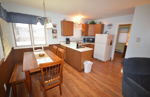 Northport House | Charming cottage with shared beachfront on Grand Traverse Bay near Northport.