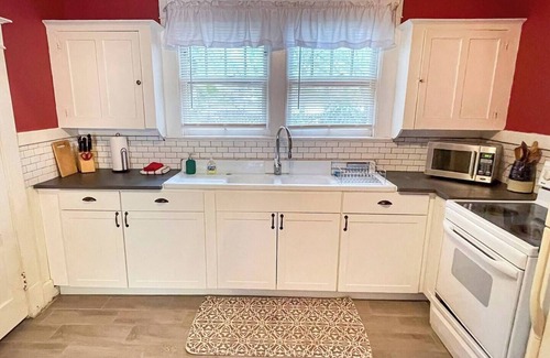 Historic Uptown Apartment | Charming Downtown Bungalow Apt. - Walk to museums & nightlife