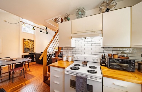 St. Elmo Improvement League House | Charming Historic Carriage House