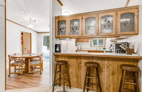 Boulder Junction House | Charming home with gas grill, full kitchen, deck, patio, TV, and washer/dryer