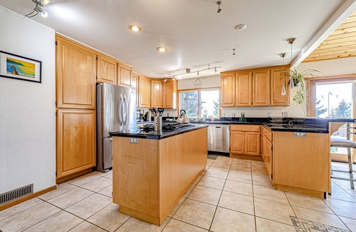 Fortuna House | Charming home with game room, full kitchen, washer/dryer, & patio - dog-friendly