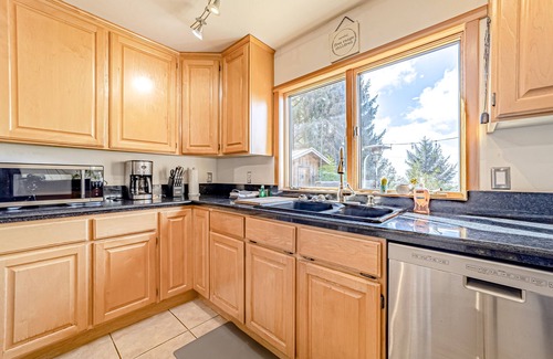 Fortuna House | Charming home with game room, full kitchen, washer/dryer, & patio - dog-friendly