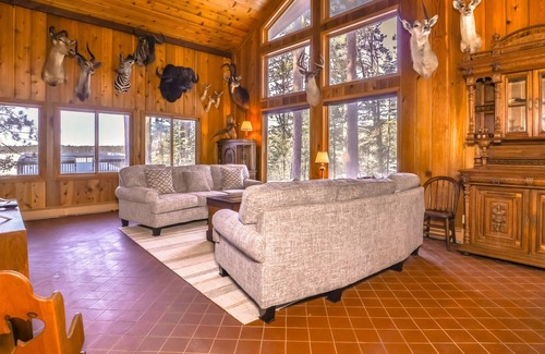 Manitowish Waters House | Charming lake view dog-friendly home with fireplace, deck, kitchen, and dock