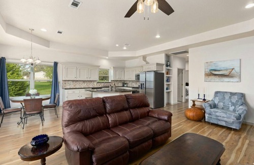West Livingston House | Charming lake-view 3 bedroom home on Livingston - gated community. Pet friendly!
