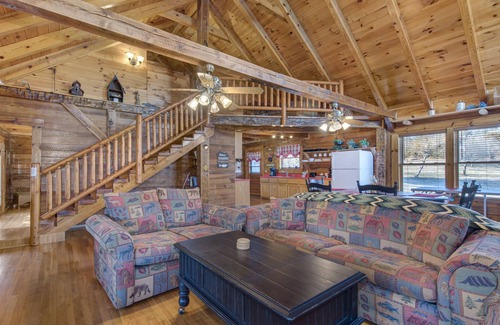Sevierville Cabin | Charming Lakefront Cabin w Fireplace, Grill, Firepit + Yard Games