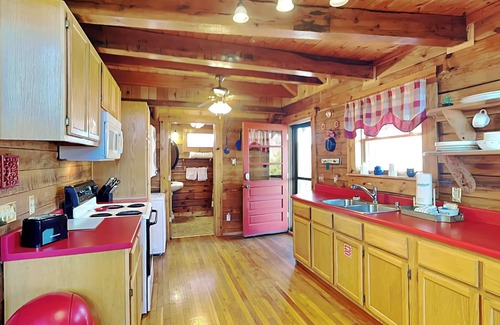 Sevierville Cabin | Charming Lakefront Cabin w Fireplace, Grill, Firepit + Yard Games