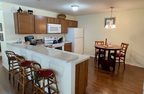 St. James House | Charming Retreat with Lanai, Patio, BBQ & Prime Location Near Town Squares!