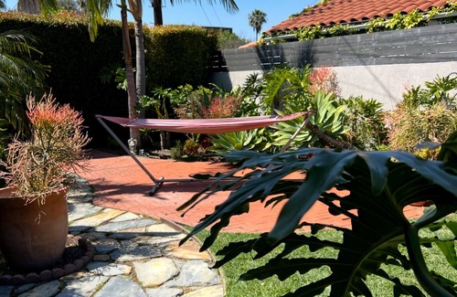 Mid City House | Charming Spanish Bungalow w/lush enclosed yard and back deck