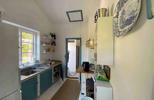 Dronningmolle House | Charming thatched-roof cottage from 1947