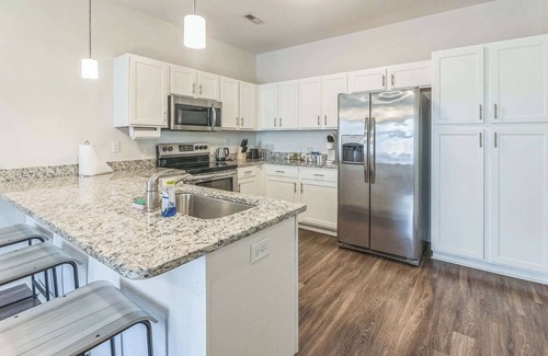 Clemson House | Charming Townhome with Fitness Studio + Grill