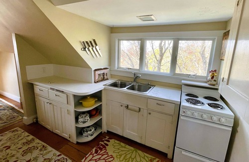 Newport East Apartment | Charming treetop apartment with ocean views & short walk to the beach
