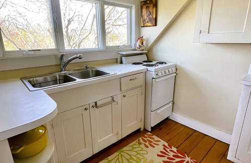 Newport East Apartment | Charming treetop apartment with ocean views & short walk to the beach