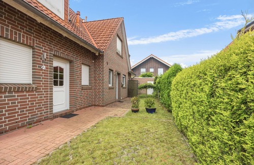 Wangerland House | Charming vacation home "Lütte Uttied": Your cozy retreat on the North Sea