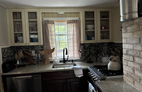West Yarmouth House | Charming Waterfront Cape Cottage with Private Beach and Beautiful Water Views